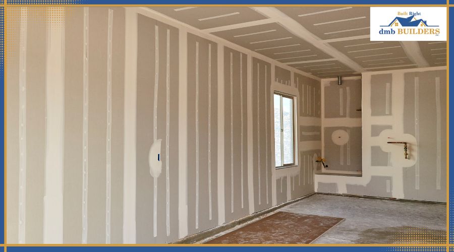 constructionframingdrywall Workers framing walls and installing drywall during remodeling